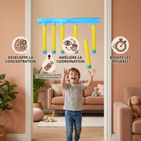 Bâtonnets tombants – jeu de réaction pour enfants